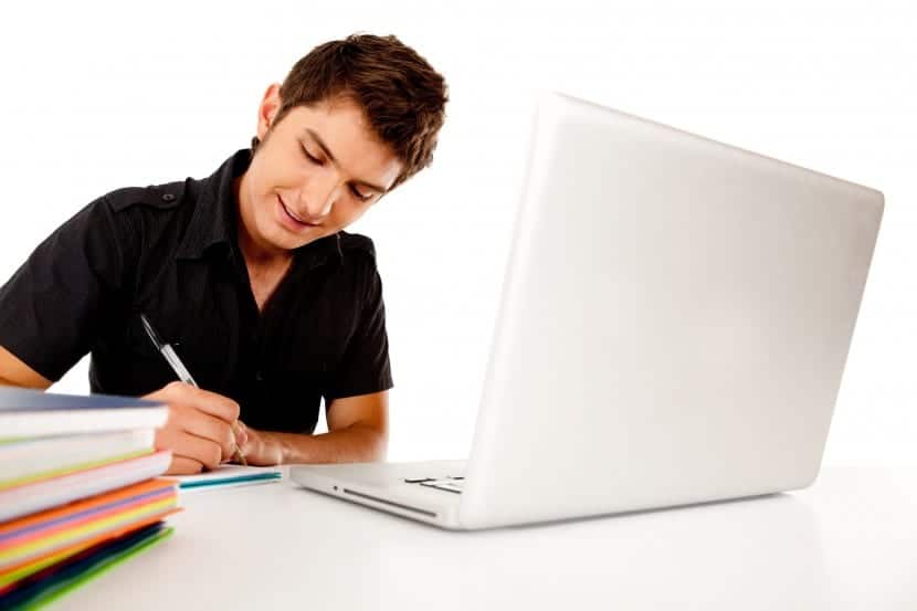 Male student with laptop