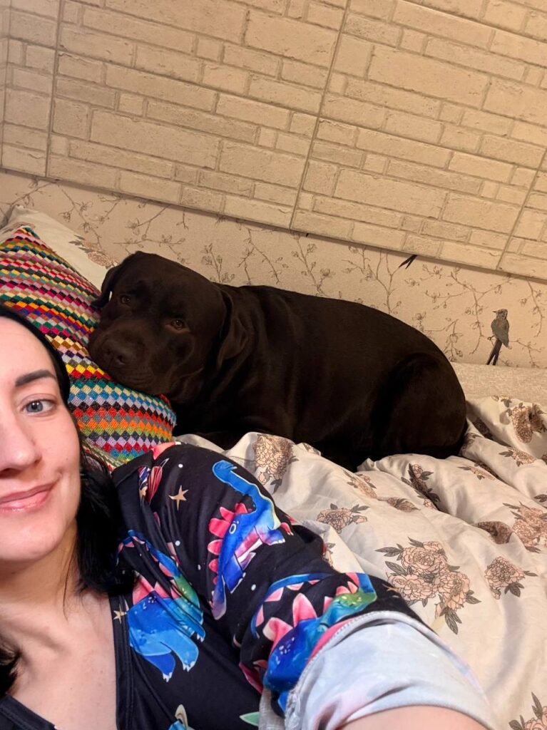 Liudmyla-and-her-dog-in-the-corridor-during-the-attack ©